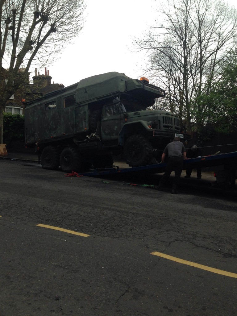 Russian truck gets loaded onto vehicle to be taken away and destroyed. Photo: Ziad Salmi
