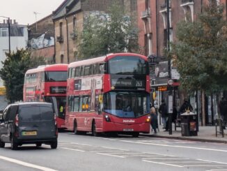 Woman hit by double-decker bus dies; driver arrested